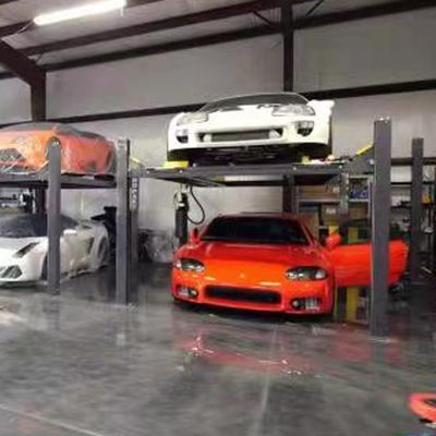 Elevador de estacionamiento de cuatro postes para elevador de vehículos, 12 unidades de carga, bajo costo de mantenimiento